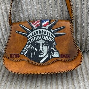 Brown Statue of Liberty Crossbody Bag